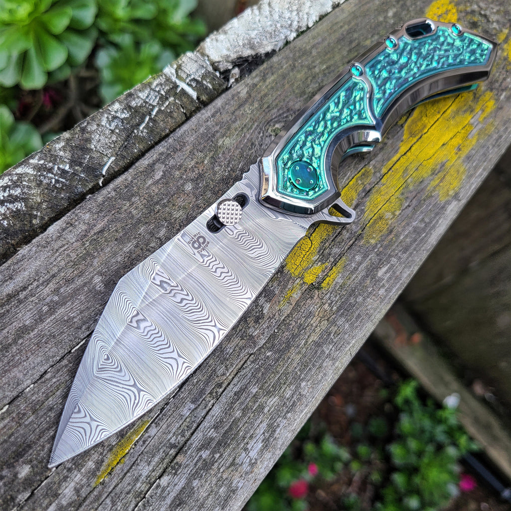 Olamic Cutlery Custom Wayfarer 247 High Polish Titanium Damasteel Folder