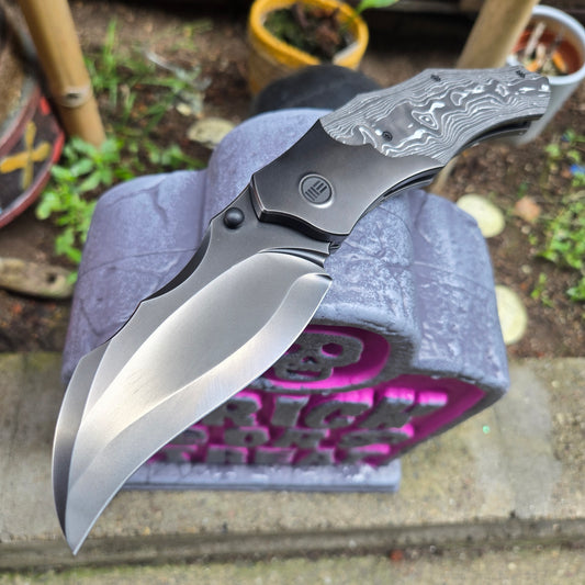 We Knife WE24042-3 Orc Boss Polished Titanium Aluminum Foil CF Inlay CPM-20CV Folder