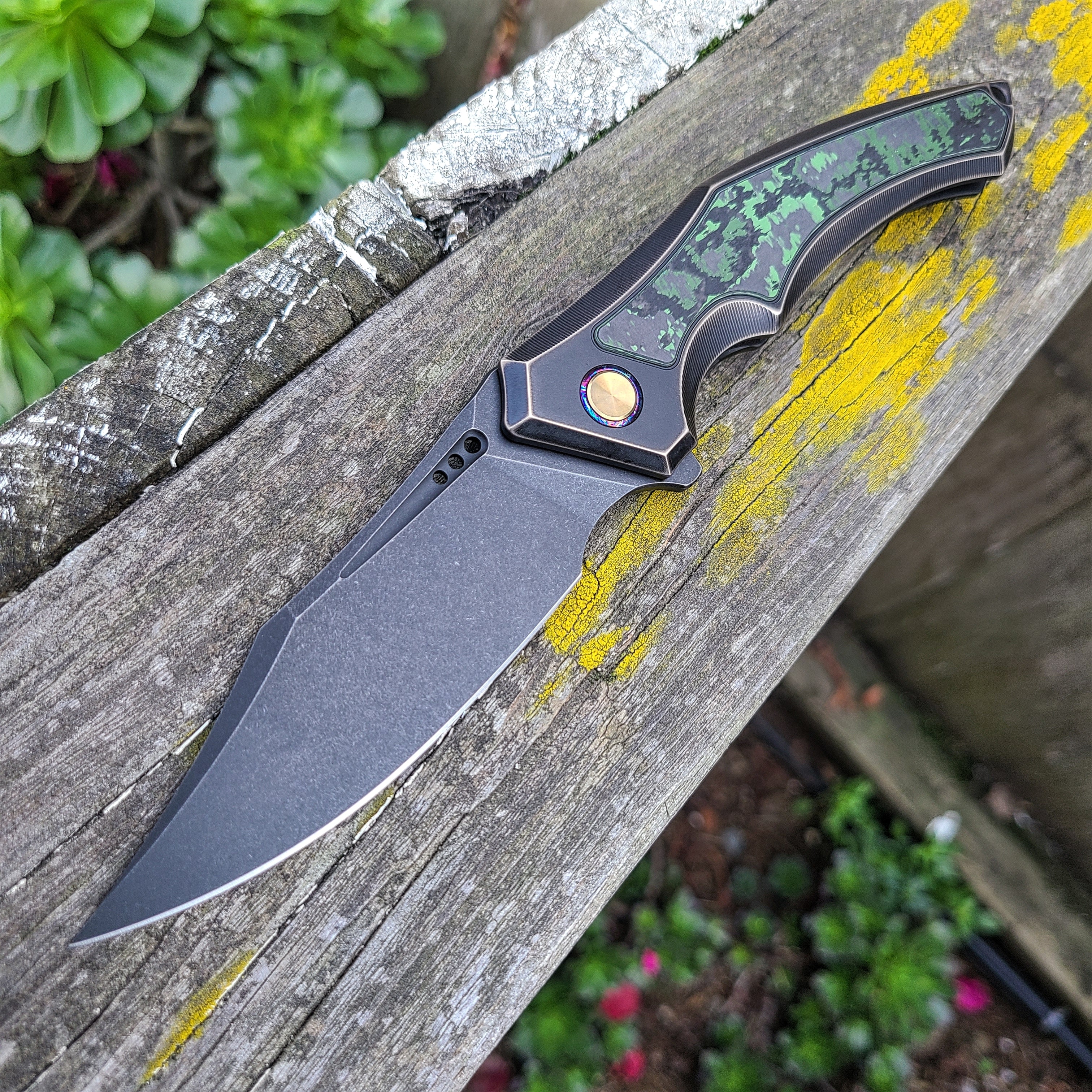 We Knife WE23009-1 Orpheus Bronze/Black Titanium Integral Handle w/ Jungle Wear Fat CF 20CV Flipper -LIMITED EDITION-