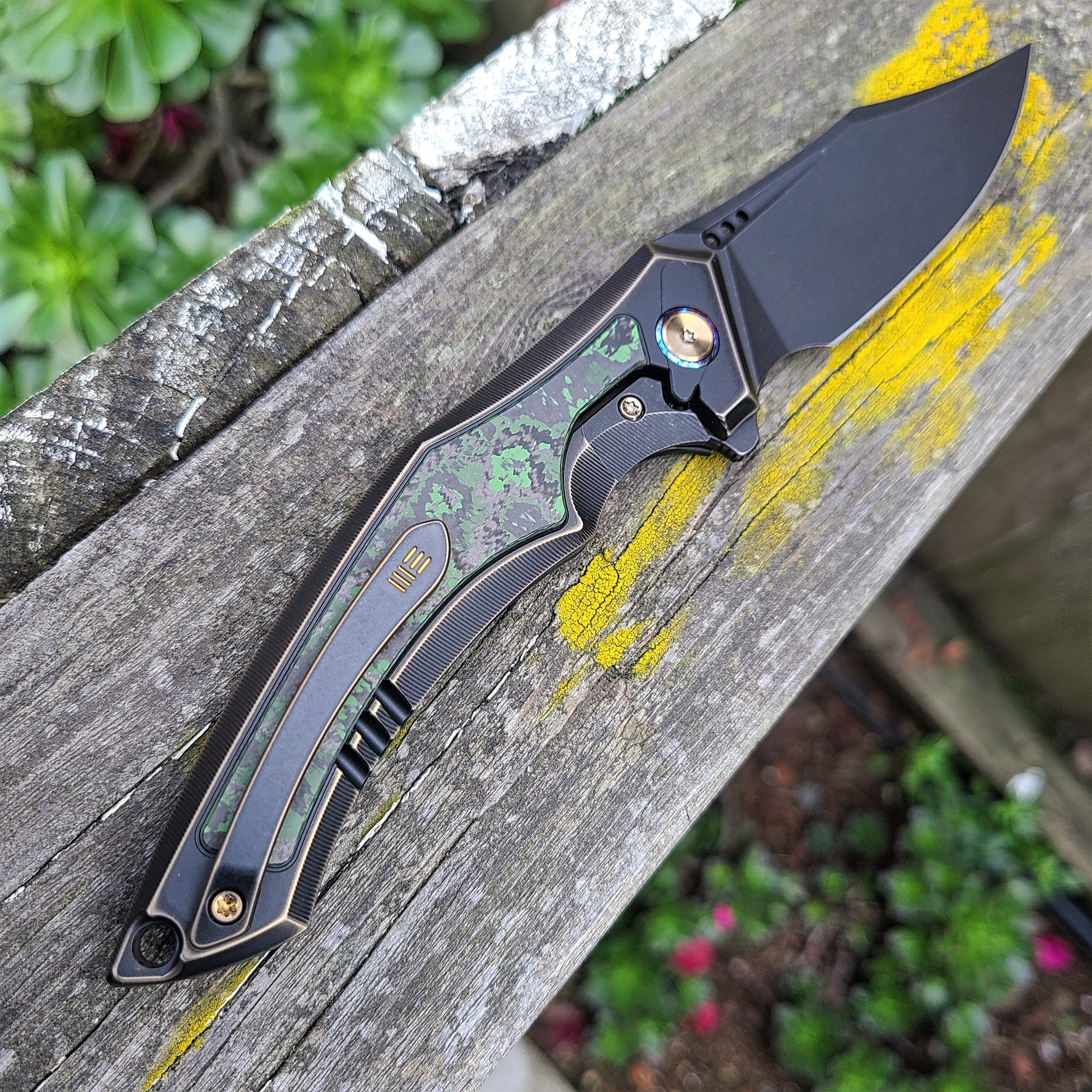 We Knife WE23009-1 Orpheus Bronze/Black Titanium Integral Handle w/ Jungle Wear Fat CF 20CV Flipper -LIMITED EDITION-