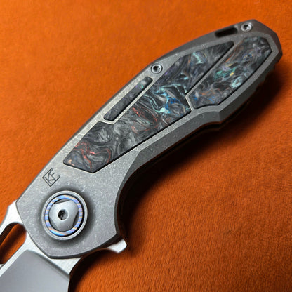 Custom Knife Factory Peaceduke 2.0 Multi Colored ZircuTi Carbon Fiber Titanium Folder