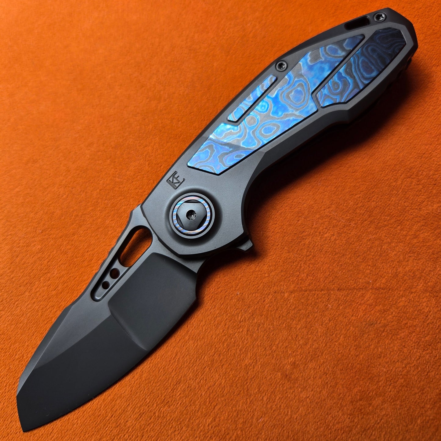 Custom Knife Factory Peaceduke 2.0 Black DLC Blue ZircuTi Titanium Folder